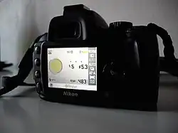 Arrière de l'appareil, l'écran visualisant les réglages.