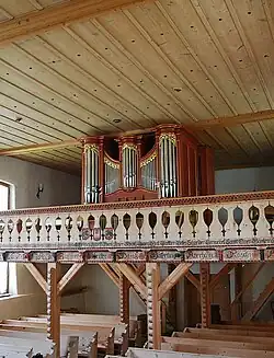 Orgue sur tribune sculptée et peinte, église d'Oberwil i. Simmental.