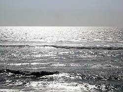 Reflets argentés de l'océan à Mimizan.