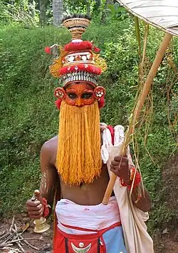 Onappottan, « le sourd d'Onam », personnage folklorique d'Onam.