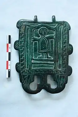 Plaque-boucle en bronze, VIe&nbsp;siècle Nécropole de Beauregard (Saint-Remèze) (collection privée).