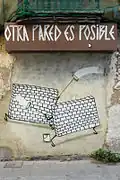 Otra pared es posible, célèbre pièce d'une série de graffitis.