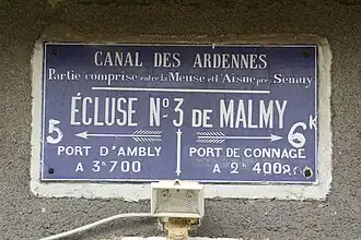 Panneau sur la maison de l'éclusier.