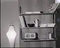 Sur étagère, l'horloge électro-mécanique"Cifra 5" (Solari)