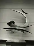 "Fughe ritmiche di luce", ottone lucidato, 1961
