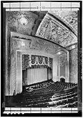 1932 view looking down from the balcony at the ceiling, proscenium, curtain, seating and hydraulic orchestra pit[Traduire&nbsp;passage]