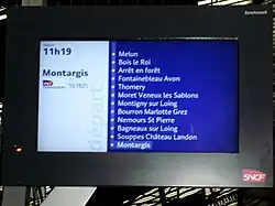 Écran de desserte du train 151825 du 23 décembre 2012 à 11:19 au départ de Paris-Gare-de-Lyon mentionnant l'arrêt en forêt.