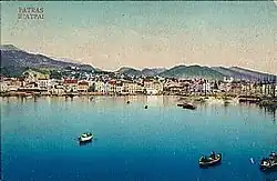 carte postale couleurs ancienne : un port au fond d'une baie