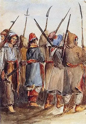Les rebelles patriotes sont pauvrement vêtus et armés d'outils agricoles.