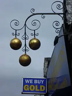 Symbole traditionnel des Prêteurs sur gage.