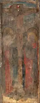 Peinture représentant Jésus sur la croix entouré d'une femme et d'un homme. En arrière-plan, une ville.