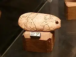 Fac-similé de la pendeloque aux aurochs.