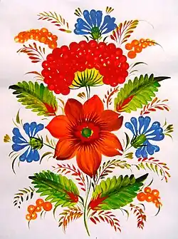 Représenté au-dessus de la fleur, le kalyna dans la peinture décorative de Petrykivka.