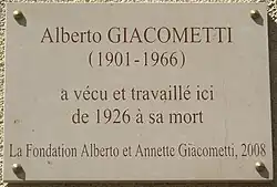 Plaque commémorative au no&nbsp;46, rue Hippolyte-Maindron (Paris).