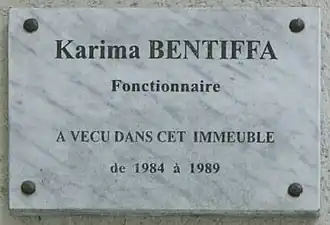 Plaque sur la façade du 9, rue Pérignon.