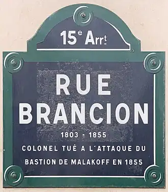 Voir la plaque.