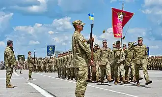 la base et défilé en 2016.