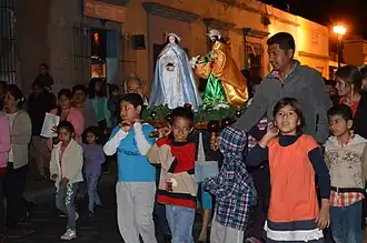 Procession dans les rues d'Oaxaca de Juárez en décembre 2014.