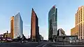 De gauche à droite : Atrium Tower&nbsp;(de), Kollhoff-Tower, BahnTower et Beisheim Center.