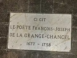 Plaque à l'entrée de la nef de l'église de Razac-sur-l'Isle.
