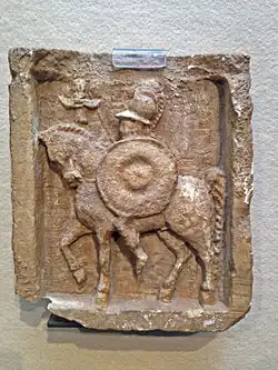 Relief votif en calcaire avec représentation d'un héros à cheval, -IIIe siècle.
