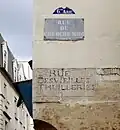 Plaque de l'ancien nom.