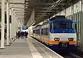 Service régional vers Rotterdam-Central via Breukelen entrant en gare.