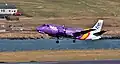 Livrée 2017 Le Saab 340 G-LGNK "Spirit of Caithness"  à l'atterrissage à Sumburgh (Îles Shetland).