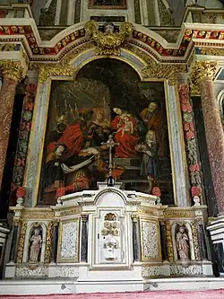 Tabernacle et tableau de l'Adoration des mages du retable de saint Léger.