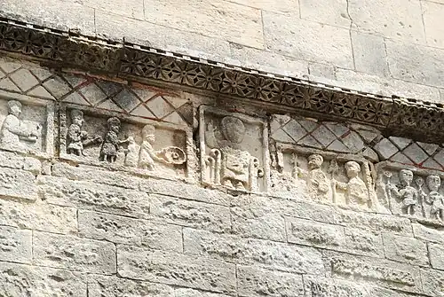 Le Christ bénissant entouré d'adorants.