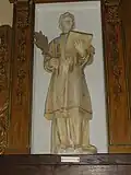 Statue de Saint-Étienne, patron de la paroisse.