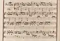 partition manuscrite rehaussée de couleurs passées rouge et bleu en bordures