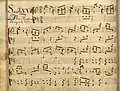 partition manuscrite rehaussée de couleurs, titre rouge et bleu