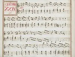 partition manuscrite aux couleurs passées rouge et bleu en bordures et cadre de titre, titre en rouge