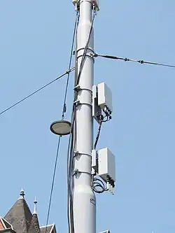 Photographie d'un site radio microcellulaire sur un lampadaire