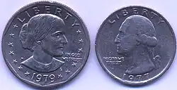 Deux pièces de monnaie,l'une avec le profil droit d'un femme, treize étoiles et les inscriptions Liberty, In God We Trust et 1979, l'autre le profil gauche d'un homme, les mêmes étoiles et inscriptions, sauf la date, 1977.