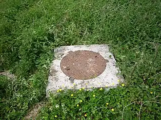 La tête de puits matérialisée La Renaissance en 2009.