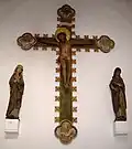 Crucifix entouré de la Vierge et de saint Jean (Schleswig-Holstein), noter les symboles des quatre évangélistes aux quatre coins de la Croix.