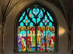 Vitrail : saint Rémi baptise Clovis le jour de Noël.