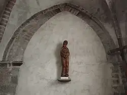 La statue en bois de Jean le Baptiste.