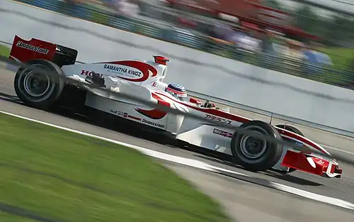 Photo de Takuma Satō sur la SA05 au GP des États-Unis 2006