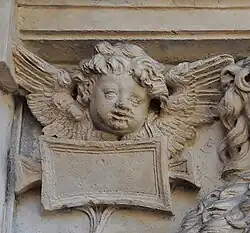 Tournoer : putto.