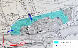 Plan d'une ville sur lequel certains quartiers sont colorisés.