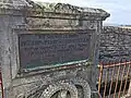 Détail de la plaque de l'ancienne tombe (en ruine) de Jeanne-Marie Moizan (1821-1893).