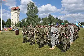 Compétition tri-nationale et le château d'eau classé.