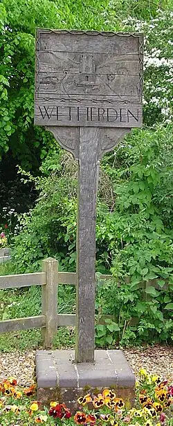 Panneau contenant l'inscription "Wetherden"
