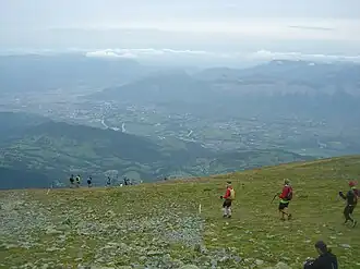 Début de la descente du Grand Colon et vue sur l'agglomération grenobloise.
