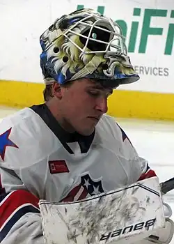 Photographie couleur d'un joueur de hockey sur glace