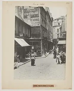 Un antiquaire rue du Sabot vers 1890 (photographie de Hippolyte Blancard).