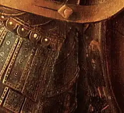 Reflet du peintre, avec son chaperon rouge, dans l'armure de Saint Georges